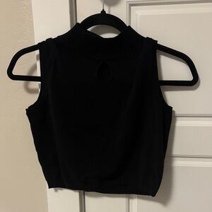 Sleeveless Mock Neck Knit Top With a central tear shaped cut - Black